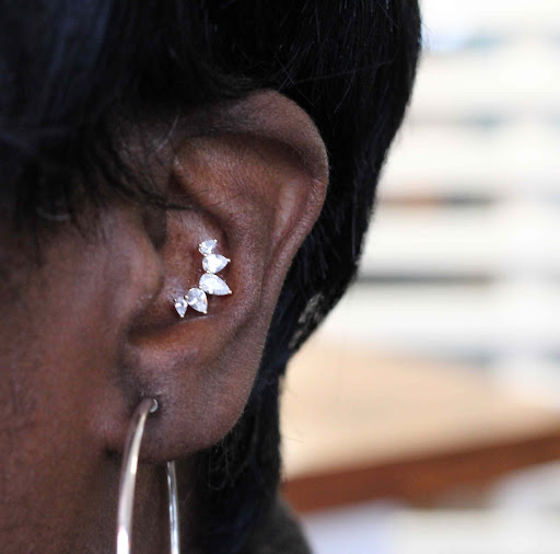 Find camping tattoo ideas for your next unique tattoo in Toledo at Piercings by Caitlin presents Holier Toledo