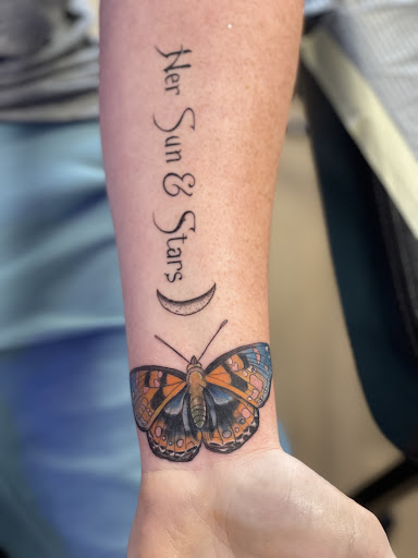 Explore atom tattoo ideas, creative tattoo ideas in Cocoa Beach, available at 13 Waves Tattoo