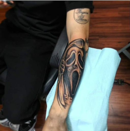 Explore women's arm tattoo ideas, creative tattoo ideas in Atlantic Beach, available at The Ink Chamber Tattoo Parlor