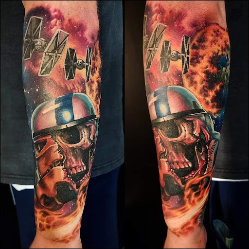 Find in between boob tattoo ideas for your next unique tattoo in Utica at Watchtower Tattoo Company