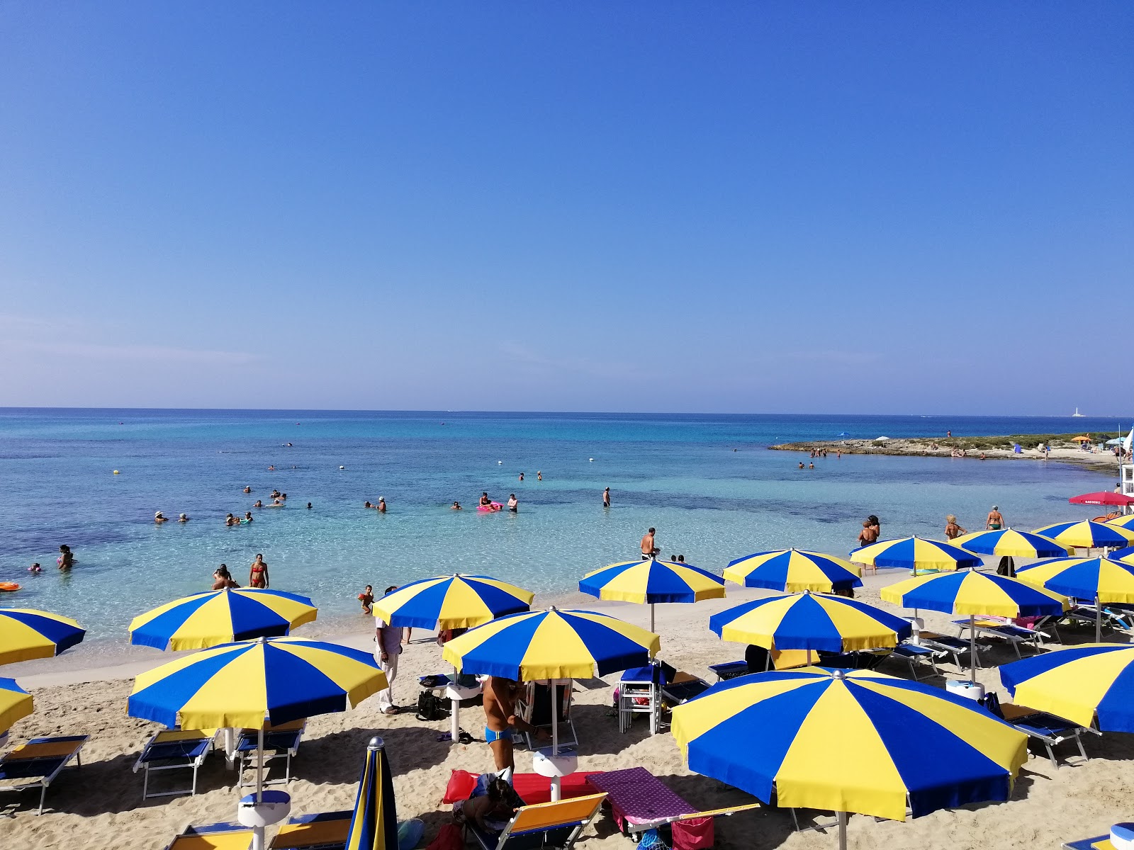 Piccolo Lido beach'in fotoğrafı küçük koy ile birlikte