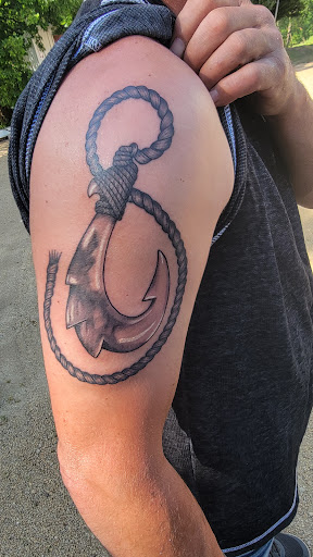 Explore trash polka tattoo ideas, creative tattoo ideas in Dubuque, available at The Crows Nest