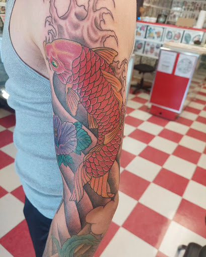 Explore leg tattoo ideas woman, creative tattoo ideas in Ambler, available at Tattoo GalaxyAmbler Piercing & Custom Tattoos