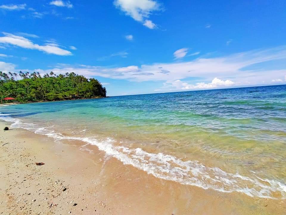 Foto av Tagumpay Beach och bosättningen