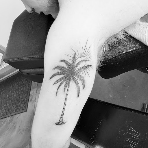 Explore kiss lip tattoo ideas, creative tattoo ideas in Traverse City, available at Pinups & Needles