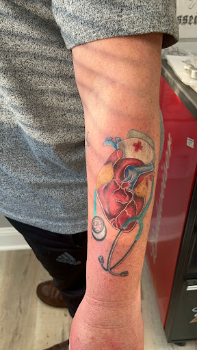 Explore salmon tattoo ideas, creative tattoo ideas in Milwaukee, available at The Skin Museum