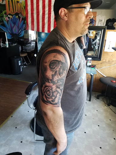 Find wristband tattoo ideas for your next unique tattoo in Jackson at T.R.A.P. Ink Tattoos and Piercings