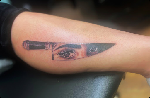 Explore pansy tattoo ideas, creative tattoo ideas in Findlay, available at Artistic Ink Findlay