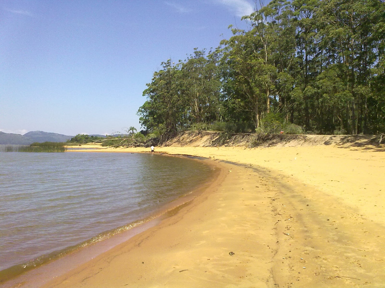 Porto do buraco porto da santa Beach的照片 带有明亮的沙子表面