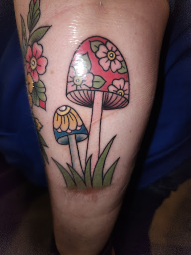 Explore tattoos on the thigh ideas, creative tattoo ideas in Portland, available at Hidden Rose Tattoo