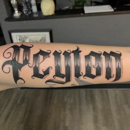 Explore brother memorial tattoo ideas, creative tattoo ideas in Ozark, available at ChrisPeckTattoos