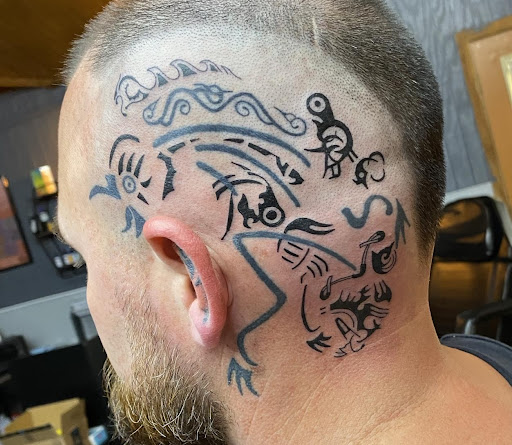 Find tattoos in between breast ideas for your next unique tattoo in Fredericksburg at Tattoo Maker Custom ink 2