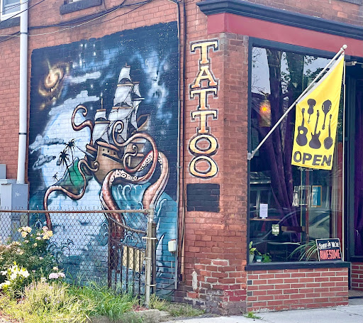 Find christmas tattoo ideas for your next unique tattoo in Easthampton at TattooNOW