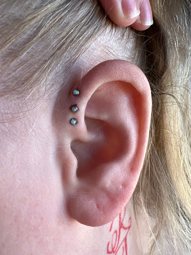 Find camping tattoo ideas for your next unique tattoo in Norman at Poke Body Piercing