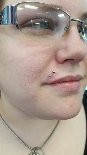 Explore dollar sign tattoo ideas, creative tattoo ideas in Saint Joseph, available at Self Expressions