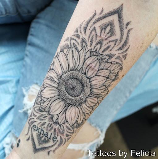 Explore black panther tattoo ideas, creative tattoo ideas in Fort Myers, available at Tiger Lotus Tattoo and Piercing