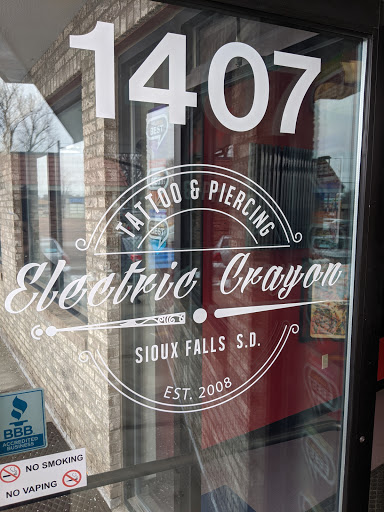 Explore women's lower back tattoo ideas, creative tattoo ideas in Sioux Falls, available at The Electric Crayon