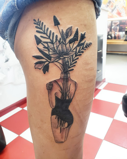 Explore cross tattoos ideas, creative tattoo ideas in Vinton, available at Cherry Bomb Tattoo and piercing