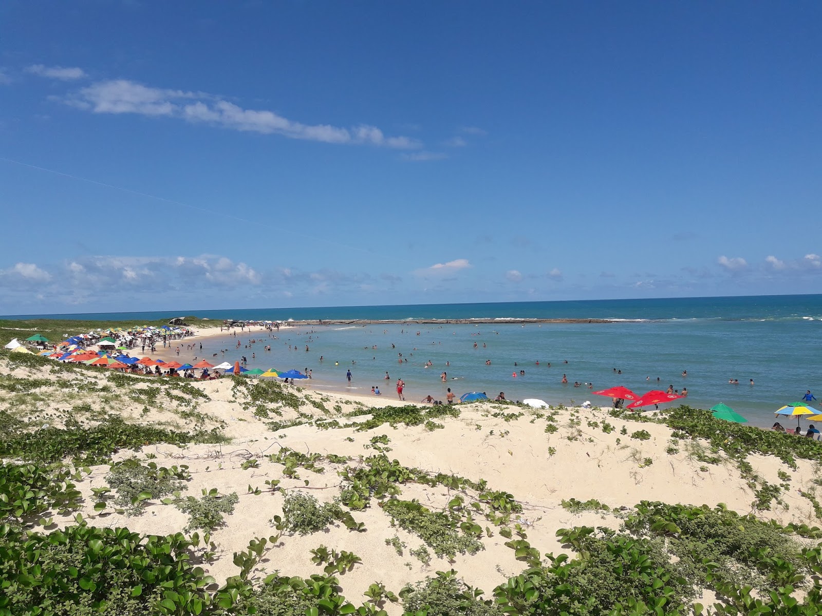 Foto van Praia do Forte met helder zand oppervlakte