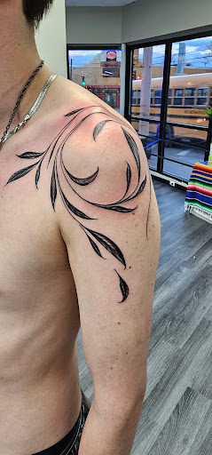 Explore leopard print tattoo ideas, creative tattoo ideas in Saint Paul, available at Olmeca Tattoo