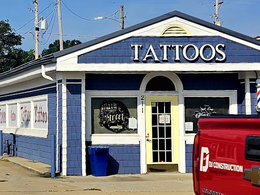 Explore spine tattoo ideas for females, creative tattoo ideas in Elkhart, available at Main Street Tattoos