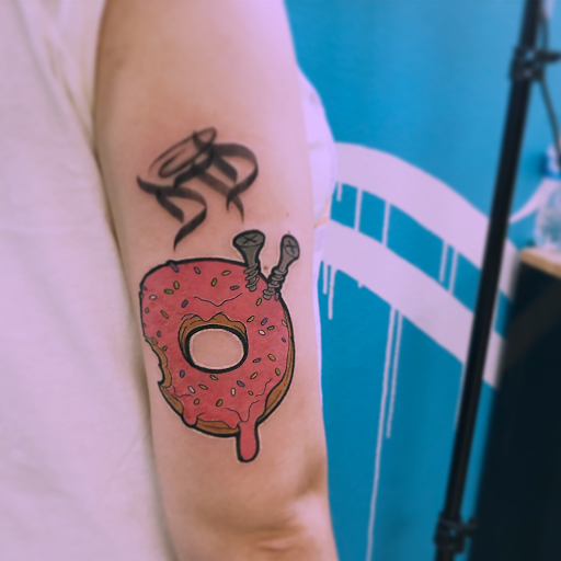 Explore tattoo ideas cover up names, creative tattoo ideas in Springdale, available at Tattoo Cartel