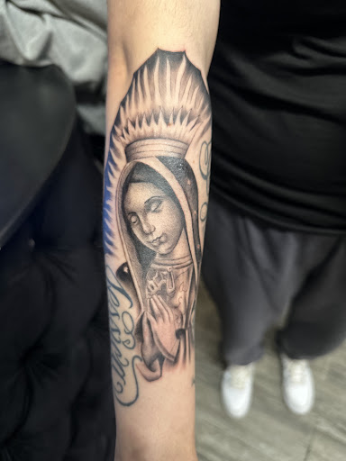 Explore cover up lower back tattoo ideas, creative tattoo ideas in Downey, available at Superior Ink Tattoo and Piercings