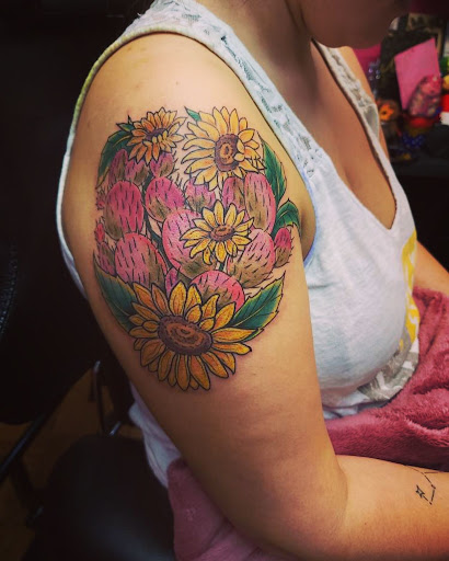 Explore back tattoos for women ideas, creative tattoo ideas in Little Falls, available at BLACKWORK TATTOO SHOP NJ