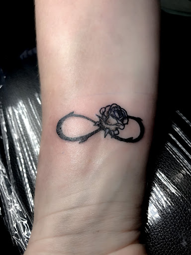 Explore hour glass tattoo ideas, creative tattoo ideas in Bowling Green, available at Ink Therapy and Body Piercing