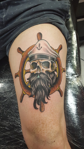 Explore fist tattoo ideas, creative tattoo ideas in Honolulu, available at Sacred Art Tattoo Waikiki