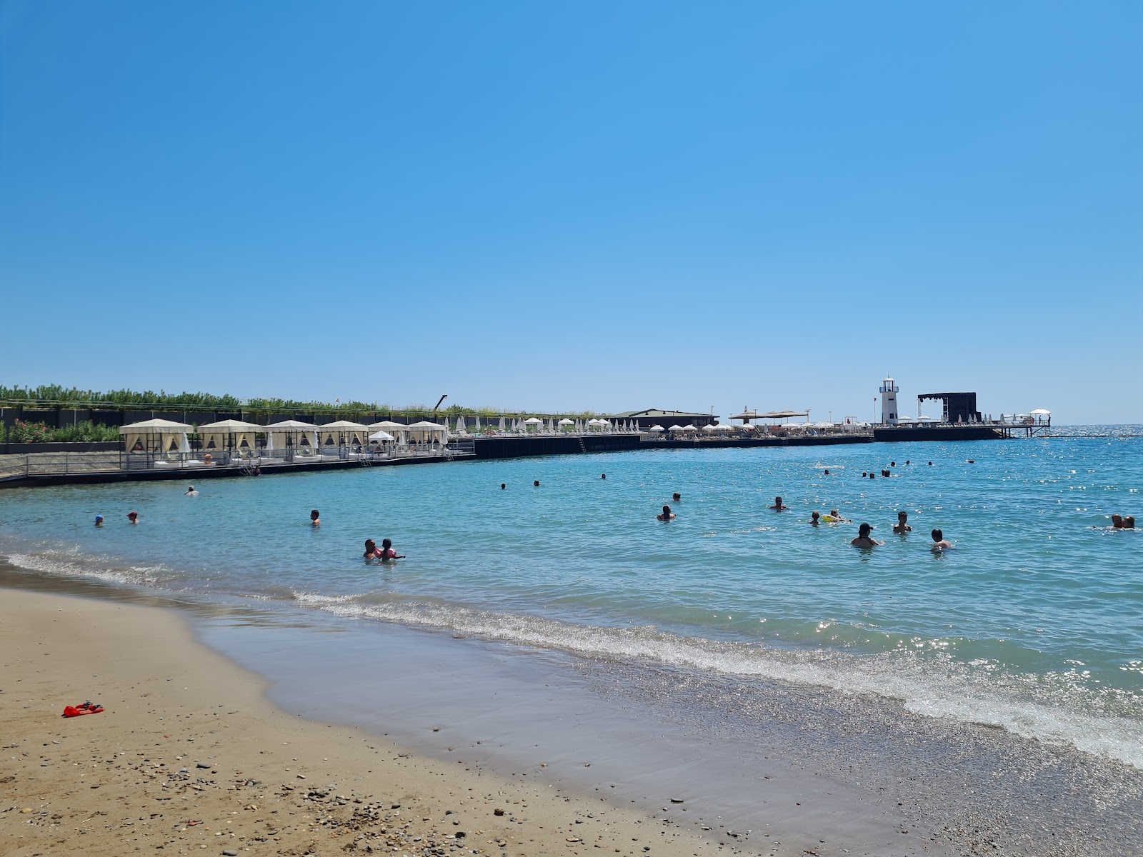 Foto von Mylome Beach mit beiger sand Oberfläche