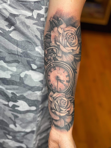 Find under breast tattoo ideas for your next unique tattoo in Baltimore at Studio 7 Tattoo and Art Gallery