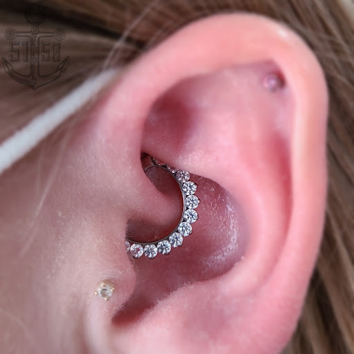 Explore navy seal tattoo ideas, creative tattoo ideas in Kearney, available at Studio 5150 Piercing & Fine Jewelry