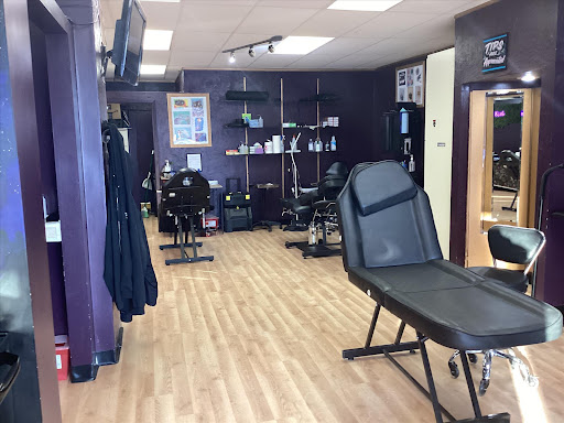 Explore tattoo finger ideas, creative tattoo ideas in Oelwein, available at Purple Thistle Tattoo