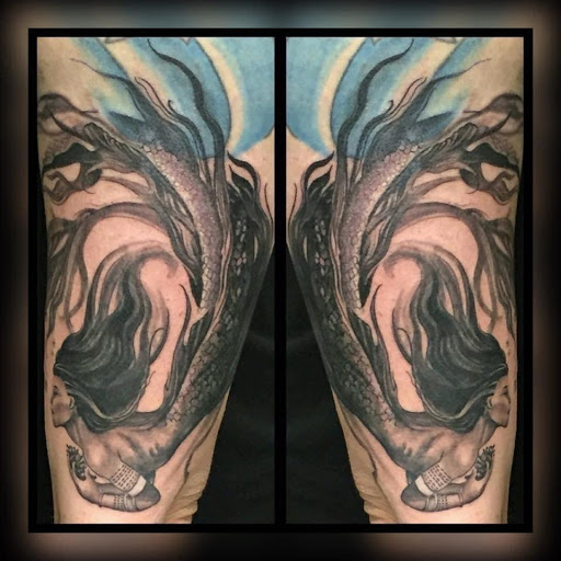 Explore arm blackout tattoo ideas, creative tattoo ideas in Savannah, available at Tatlyfe Studios