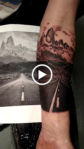 Explore tomahawk tattoo ideas, creative tattoo ideas in Marietta, available at Monkeys Uncle Tattoo