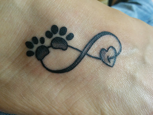 Roger Tattoo