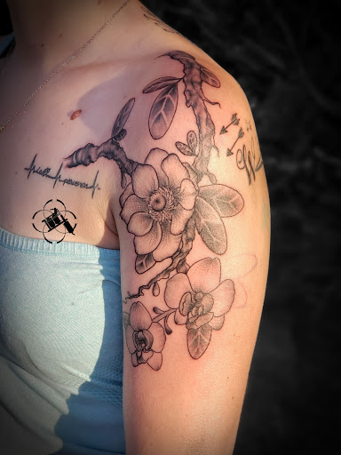 Explore small daisy tattoo ideas, creative tattoo ideas in Santa Fe, available at Rivers Collective Body Art