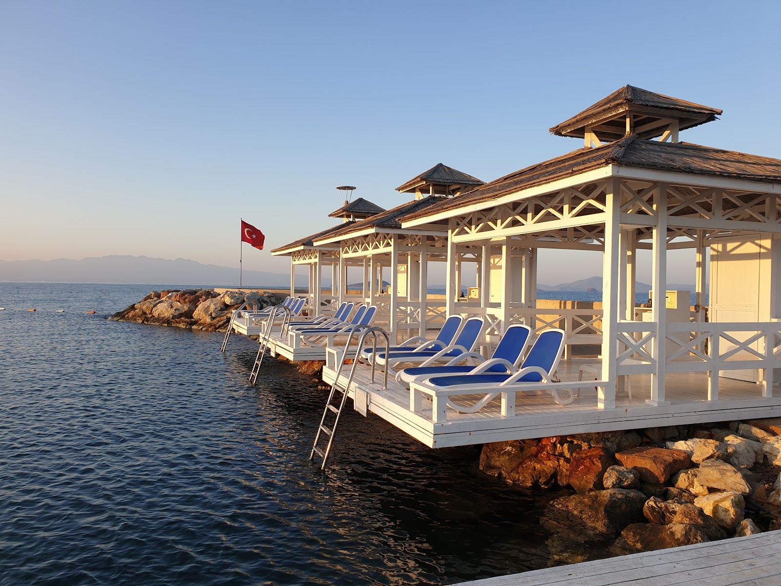 Photo of Ayvan beach II with blue pure water surface