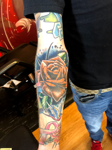 Explore ripped tattoo ideas, creative tattoo ideas in Portland, available at Art Immortal Tattoo and Piercing