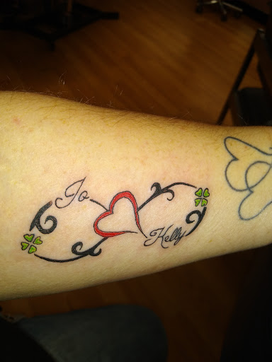 Tattoo Shop «West Coast Tattoos», reviews and photos, 719 E Tennessee St, Florence, AL 35630, USA