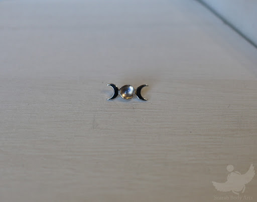 Explore women's leg tattoo ideas, creative tattoo ideas in Syracuse, available at Scarab Body Arts