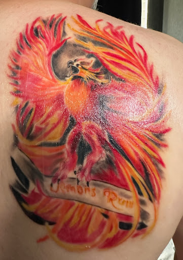 Explore august birth flower tattoo ideas, creative tattoo ideas in Rockport, available at Electric Sunset Tattoo