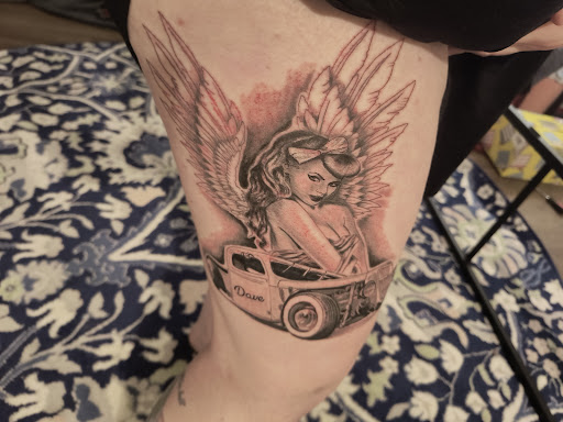 Explore tattoo flower sleeve ideas, creative tattoo ideas in Redding, available at Dominant Ink