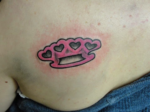 Explore skull neck tattoo ideas, creative tattoo ideas in La Crosse, available at La Crosse Tattoo