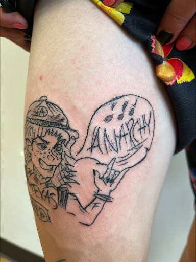 Explore hand tattoos for men ideas, creative tattoo ideas in Seymour, available at American Gypsy Tattoo Corp.