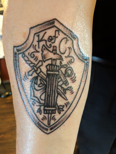 Explore frog tattoo ideas, creative tattoo ideas in Huntsville, available at Blacktide Tattoo Co.