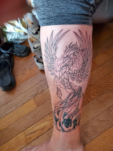 Explore feminine dragon tattoo ideas, creative tattoo ideas in North Aurora, available at Ink Bar Tattoo