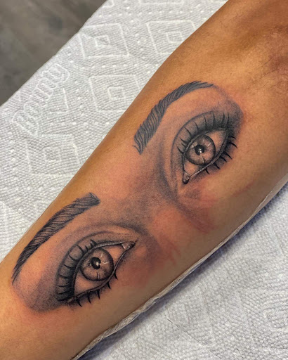 Explore christian tattoo ideas for women, creative tattoo ideas in Westland, available at Premier Tattoo Company Westland