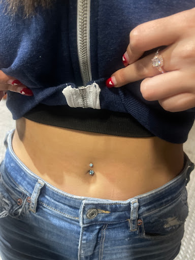 Find breast tattoo ideas for females for your next unique tattoo in Lake Villa at Eternal Tiger Tattoo